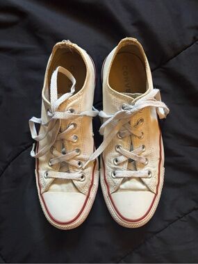 low-top white converse sneakers
